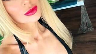 Woman Dominates in Wetlook Suit and Leather Boots Display