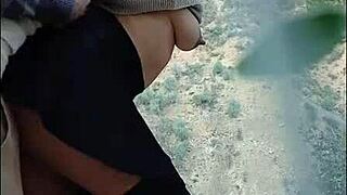 Hot woman receives spanks outdoors