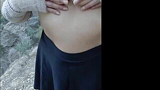 Hot woman receives spanks outdoors