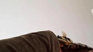 Elza Koms performs striptease and footjob with ass worshiping