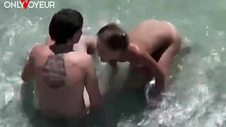 Beach voyeur catches amateur couple's quick ocean wave fuck.