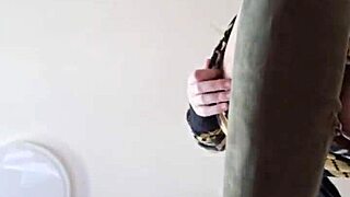 Elza Koms performs striptease and footjob with ass worshiping