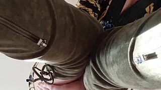 Elza Koms performs striptease and footjob with ass worshiping