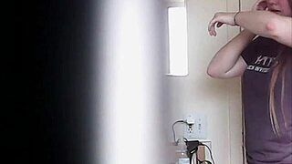 big boobs blonde caught changing voyeur style!