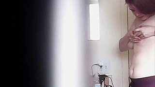 big boobs blonde caught changing voyeur style!