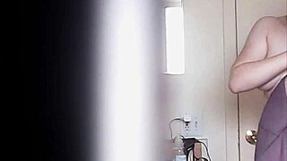 big boobs blonde caught changing voyeur style!