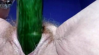 granny gets wild, stuffing her hairy pussy and ass with a cucumber. just another day!