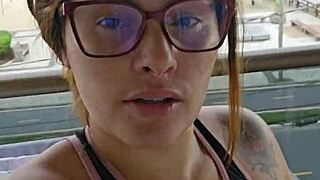 Girl flashing ass on balcony in skirt