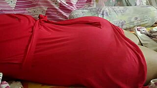 The wild hot desi girlfriend in red receives a hot body massage from her old friend, showcasing her big ass and sexy curves
