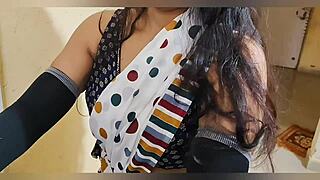 desi young sister-in-law and brother-in-law in kitchen