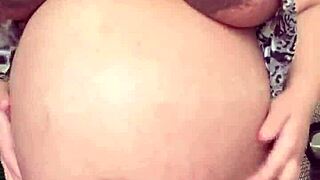 Horny pregnant maid reveals big boobs and hairy pussy on camera while alone