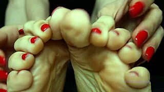 petite mistress with red toenail polish dominates sensually
