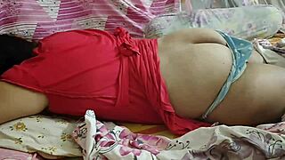 The wild hot desi girlfriend in red receives a hot body massage from her old friend, showcasing her big ass and sexy curves