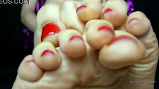 petite mistress with red toenail polish dominates sensually