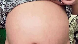 Horny pregnant maid reveals big boobs and hairy pussy on camera while alone