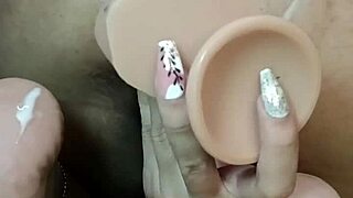 This young latina with a delicious ass rides a giant dildo until she cums