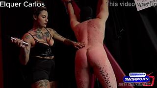 She dominates her slave with a whip at home