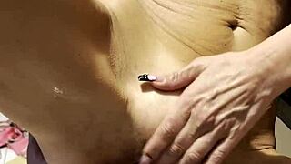 Watch her masturbate with big dildos in the kitchen. She wears lingerie and shows small tits.