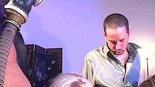 Missy Monroe watches her friends in a latex foursome