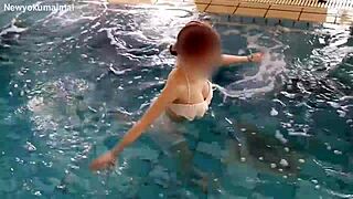 Exercise in the pool with cute legs and small tits on display.