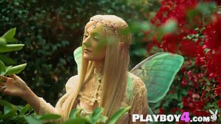 Petite Blonde Eva Elfie Strips in Sexy Costume for Outdoor Pose