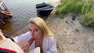 Hot blonde in fishnets gives blowjob outdoors.