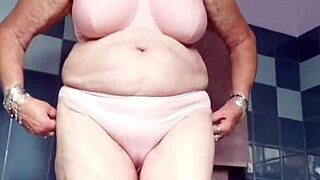 German Granny Slams Hairy Pussy with Cucumber in Wild Action