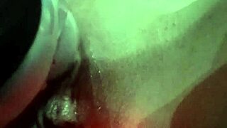 massager on the shaved pussy area