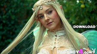 Petite Blonde Eva Elfie Strips in Sexy Costume for Outdoor Pose