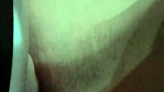 massager on the shaved pussy area