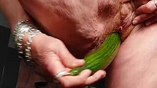 German Granny Slams Hairy Pussy with Cucumber in Wild Action