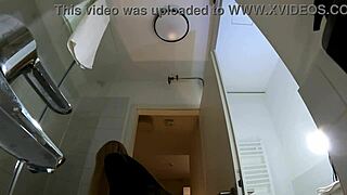 Look at this big tits babe doing a striptease in the bathroom with pantyhose and heels