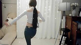Sexy chinese girl strips and dances live on camera for viewers