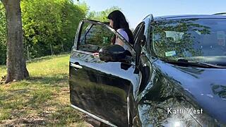 crazy teen girl squirts wildly on the car roof to clean the windshield!