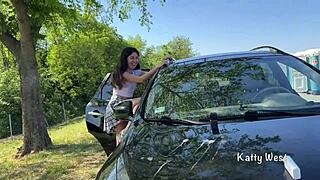 crazy teen girl squirts wildly on the car roof to clean the windshield!