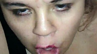 A woman performs oral sex on a large penis