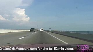 Dream girl flashes big tits topless in convertible over skyway bridge