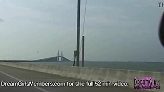 Dream girl flashes big tits topless in convertible over skyway bridge