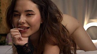 The most flexible girl uses a dildo and licks her own pussy before squirting in a solo performance