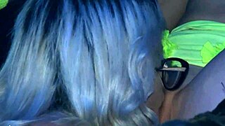 Blonde tattooed loiras get wild, licking each other at the club.