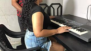 This curvy young Colombian in a tight skirt rocks hot keyboard lessons