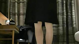 tranny femboy in black dress performs handjob with cumshot