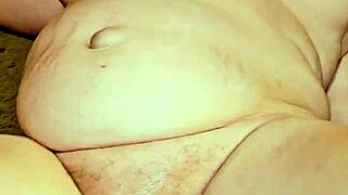 A woman moans softly during a quiet moment