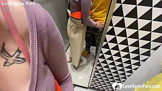 gf gives a blowjob in the changing booth