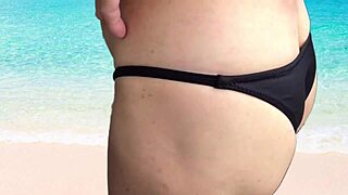 Beach handjob in sexy bikini with wave sounds.