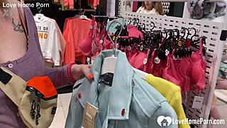 gf gives a blowjob in the changing booth