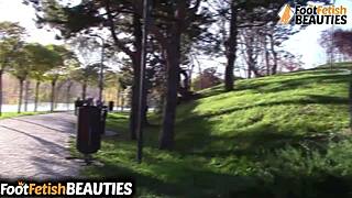 i love the brunette babe taking off socks barefoot in park