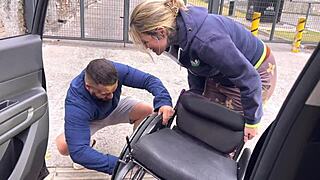 The app driver woman, with big natural tits, picks up a wheelchair user at the station. Unable to pay, she offers oral after peeing.