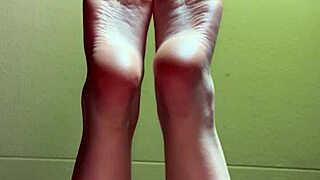 White girl shows feet in socks for cash