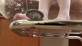 Talia's Stockings Get Wet While Smoking